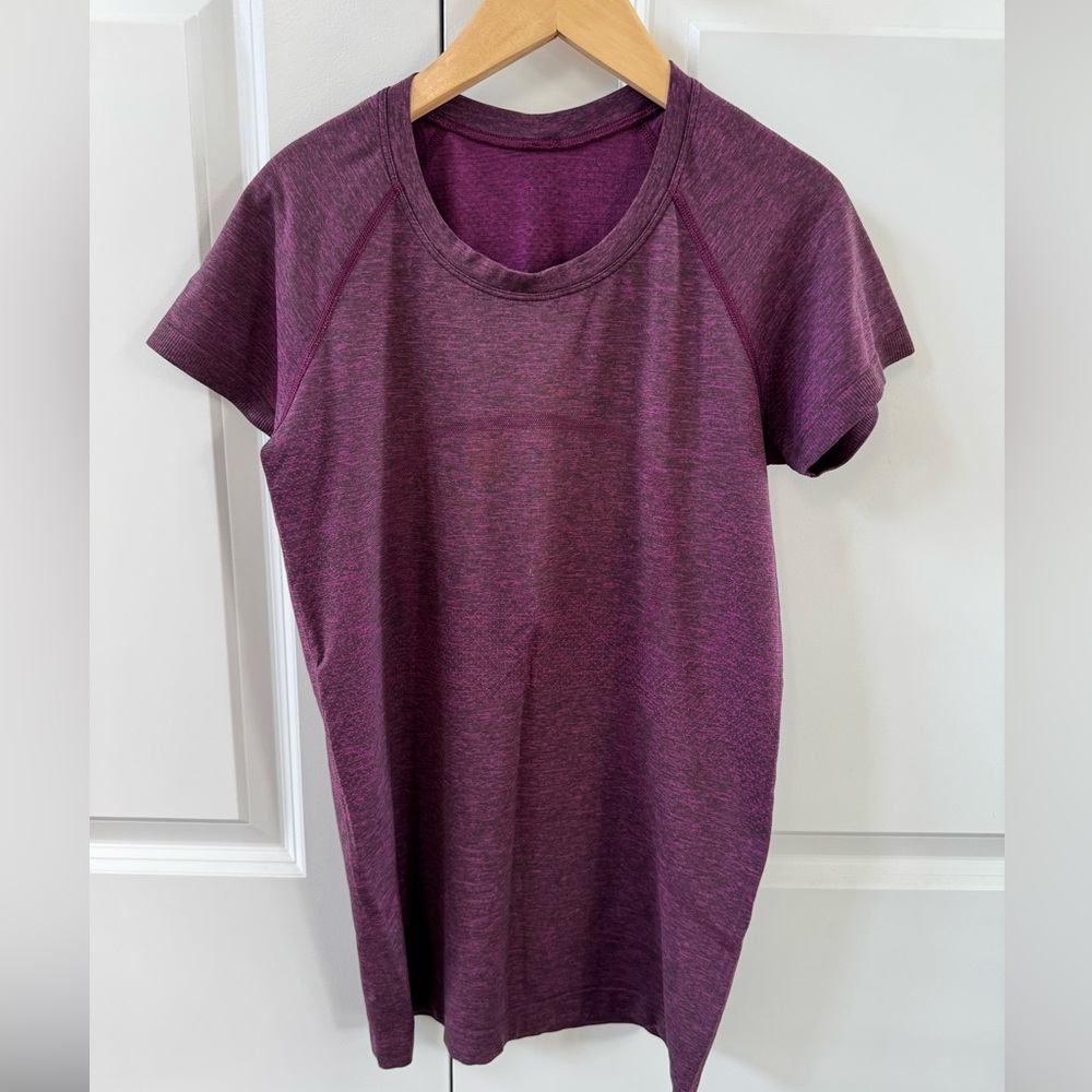 Lululemon swiftly tech short sleeve shirt.  Hip length.